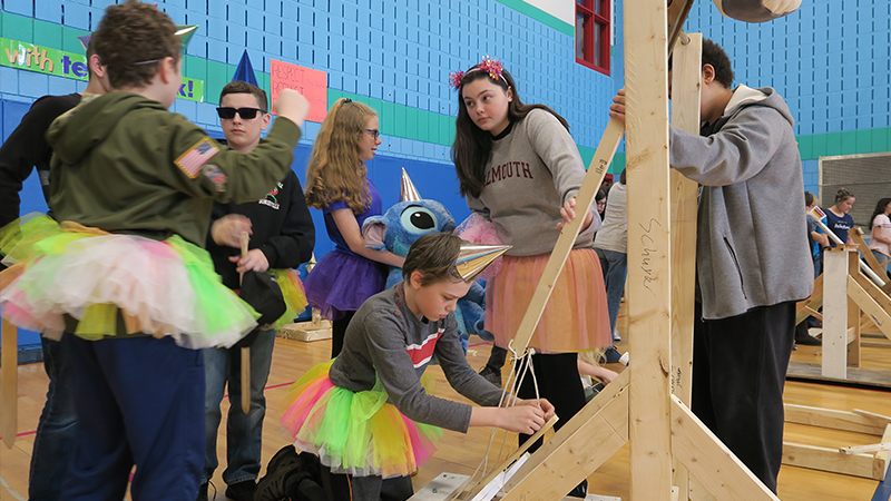 Kennedy students prepare their catapult