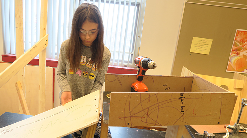 Student assembles last year's engineering project